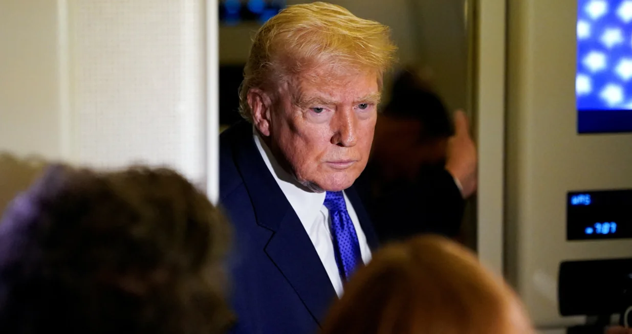 U.S. President Donald Trump speaks to reporters onboard Air Force One, on travel from West Palm Beach, Florida, to Joint Base Andrews, Maryland, U.S., February 16, 2026. REUTERS/Elizabeth Frantz/Elizabeth Frantz
