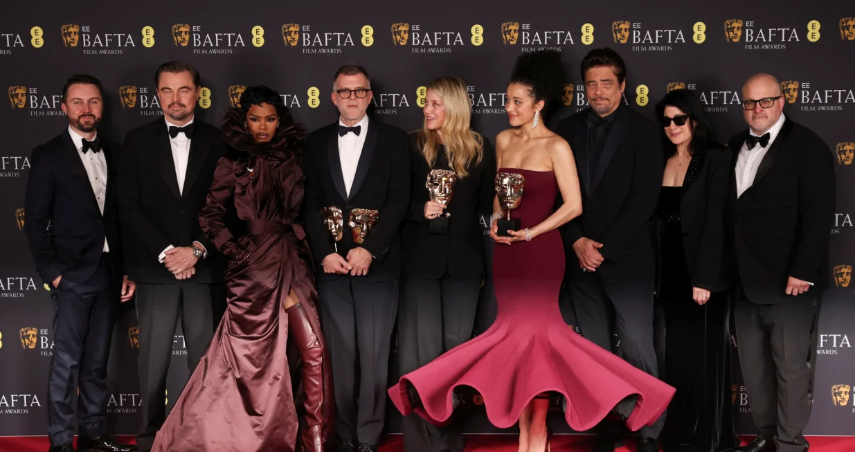 Director Paul Thomas Anderson, editor Andy Jurgensen, producer Sara Murphy, Cassandra Kulukundis, cinematographer Michael Bauman and cast members Leonardo DiCaprio, Benicio Del Toro, Teyana Taylor, Chase Infiniti pose with the awards for Best Film Award, Director Award, Adapted Screenplay Award and Cinematography Award for 'One Battle After Another' at the 2026 British Academy of Film and Television Awards (BAFTA) at the Royal Festival Hall in the Southbank Centre, London, Britain, February 22, 2026. REUTERS/Suzanne Plunkett  TPX IMAGES OF THE DAY/Suzanne Plunkett