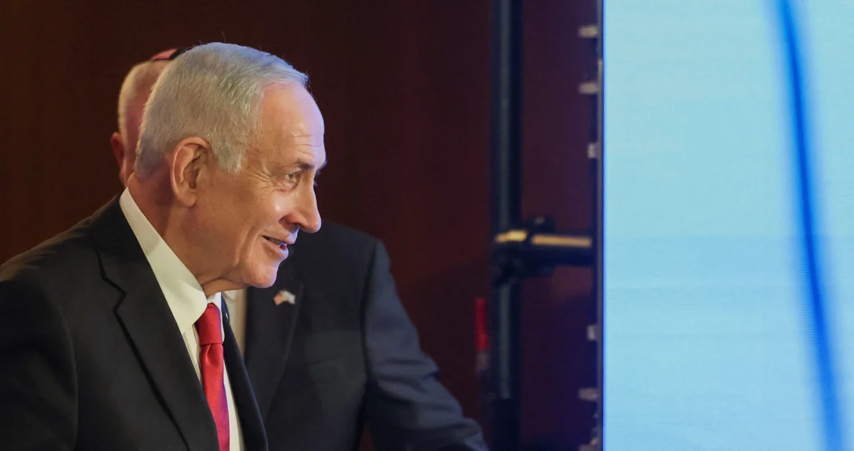 Israeli Prime Minister Benjamin Netanyahu gestures goes onstage to speak during the Conference of Presidents of Major American Jewish Organisations, in Jerusalem, February 15, 2026. REUTERS/Ronen Zvulun/Ronen Zvulun
