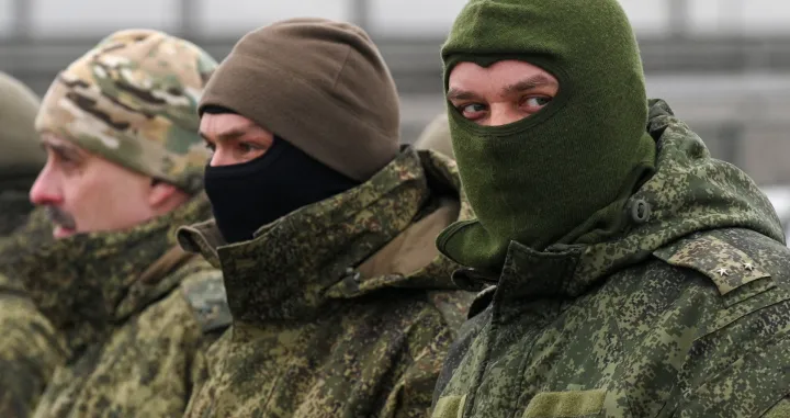 Russian service members take part in a ceremonial handover of humanitarian aid provided by employees of the truckmaker Kamaz, mediated by the People's Front political movement and intended for Russia's army involved in the ongoing military conflict against Ukraine, in Rostov-on-Don, Russia, February 20, 2026. REUTERS/Sergey Pivovarov/Sergey Pivovarov