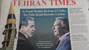 An Iranian newspaper with a cover photo of Iran's Foreign Minister Abbas Araqchi and U.S. Middle East envoy Steve Witkoff, in Tehran, Iran, February 7, 2026. Majid Asgaripour/WANA (West Asia News Agency) via REUTERS ATTENTION EDITORS - THIS PICTURE WAS PROVIDED BY A THIRD PARTY/Majid Asgaripour