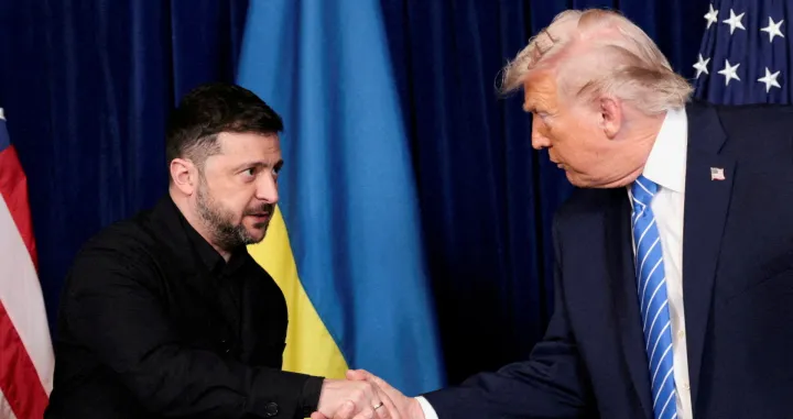 FILE PHOTO: U.S. President Donald Trump and Ukrainian President Volodymyr Zelenskiy shake hands during a press conference after their lunch meeting at Trump?s Mar-a-Lago club, in Palm Beach, Florida, U.S., December 28, 2025. REUTERS/Jonathan Ernst/File Photo/Jonathan Ernst