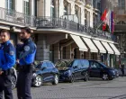 Police officers stand in front of the Four Seasons Hotel des Bergues Geneva as they secure the city on the day of U.S.-mediated peace talks between Russia and Ukraine, in Geneva, Switzerland, February 26, 2026. REUTERS/Pierre Albouy/Pierre Albouy