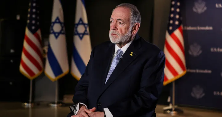 FILE PHOTO: U.S. Ambassador to Israel Mike Huckabee looks on during an interview with Reuters in Jerusalem, September 10, 2025. REUTERS/Ronen Zvulun/File Photo/Ronen Zvulun