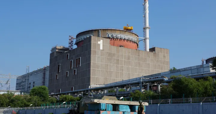 FILE PHOTO: A Russian service member stands guard at a checkpoint near the Zaporizhzhia Nuclear Power Plant before the arrival of an International Atomic Energy Agency (IAEA) expert mission in the course of Russia-Ukraine conflict outside Enerhodar in the Zaporizhzhia region, Russian-controlled Ukraine, June 15, 2023. REUTERS/Alexander Ermochenko/File Photo/Alexander Ermochenko