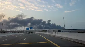 Smoke billows from Jebel Ali port after an Iranian attack, following United States and Israel strikes on Iran, in Dubai, United Arab Emirates, March 1, 2026. REUTERS/Abdelhadi Ramahi/Abdelhadi Ramahi