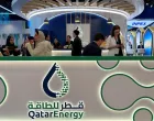 FILE PHOTO: People visit the QatarEnergy booth at the World Gas Conference exhibition in Beijing, China May 21, 2025. REUTERS/Liz Lee/File Photo/Liz Lee