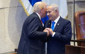 FILE PHOTO: President Donald Trump talks with Israel's Prime Minister Benjamin Netanyahu at the Knesset, Monday, Oct. 13, 2025, in Jerusalem.  Evan Vucci/Pool via REUTERS/File Photo/Evan Vucci