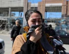 A woman reacts on the street following an Israeli and U.S. strike on a police station, amid the U.S.-Israeli conflict with Iran, in Tehran, Iran, March 3, 2026. Majid Asgaripour/WANA (West Asia News Agency) via REUTERS ATTENTION EDITORS - THIS PICTURE WAS PROVIDED BY A THIRD PARTY  TPX IMAGES OF THE DAY/Majid Asgaripour