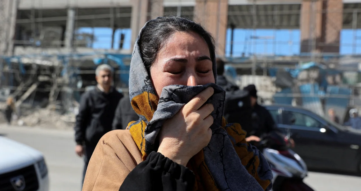 A woman reacts on the street following an Israeli and U.S. strike on a police station, amid the U.S.-Israeli conflict with Iran, in Tehran, Iran, March 3, 2026. Majid Asgaripour/WANA (West Asia News Agency) via REUTERS ATTENTION EDITORS - THIS PICTURE WAS PROVIDED BY A THIRD PARTY  TPX IMAGES OF THE DAY/Majid Asgaripour
