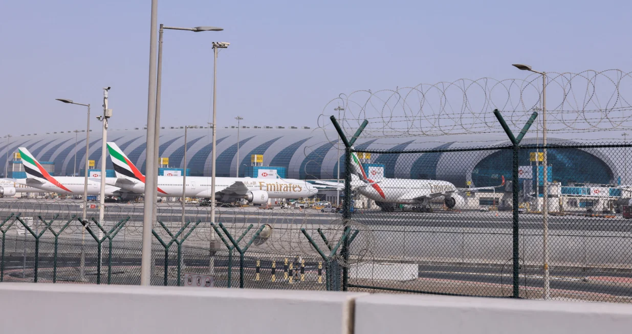 Planes are parked at Terminal 3 of the Dubai International Airport, following the United States and Israel strikes on Iran, in Dubai, United Arab Emirates, March 2, 2026. REUTERS/Raghed Waked/Raghed Waked