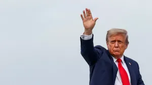 FILE PHOTO: U.S. President Donald Trump waves as he boards Air Force One upon departure following his meeting with Russian President Vladimir Putin to negotiate an end to the war in Ukraine, at Joint Base Elmendorf-Richardson, Alaska, U.S., August 15, 2025. REUTERS/Kevin Lamarque/File Photo/Kevin Lamarque