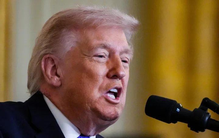 FILE PHOTO: U.S. President Donald Trump speaks, as a patch of blemished skin is visible above his shirt collar, during a Medal of Honor ceremony at the White House in Washington, D.C., U.S., March 2, 2026. REUTERS/Ken Cedeno/File Photo/Ken Cedeno
