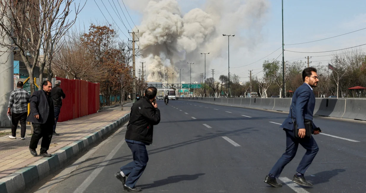 People run as smoke rises following an explosion, amid the U.S.-Israeli conflict with Iran, in Tehran, Iran, March 5, 2026. Majid Asgaripour/WANA (West Asia News Agency) via REUTERS ATTENTION EDITORS - THIS PICTURE WAS PROVIDED BY A THIRD PARTY  TPX IMAGES OF THE DAY/Majid Asgaripour
