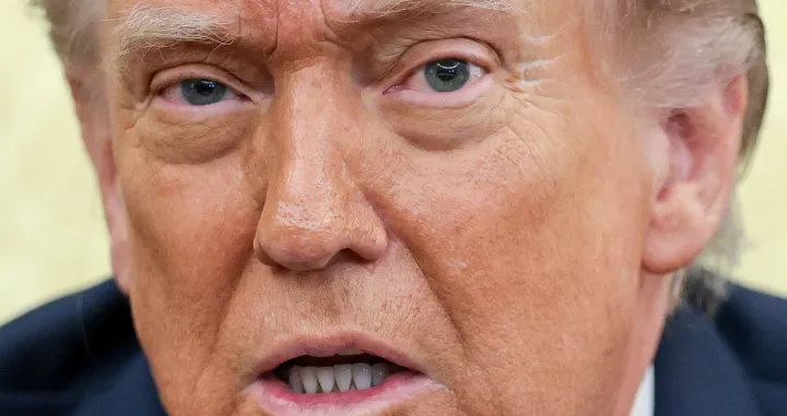 FILE PHOTO: U.S. President Donald Trump speaks as he meets with German Chancellor Friedrich Merz (not pictured) in the Oval Office at the White House in Washington, D.C., U.S., March 3, 2026. REUTERS/Jonathan Ernst/File Photo/Jonathan Ernst