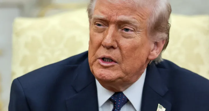 U.S. President Donald Trump speaks as he meets with German Chancellor Friedrich Merz (not pictured) in the Oval Office at the White House in Washington, D.C., U.S., March 3, 2026. REUTERS/Jonathan Ernst/Jonathan Ernst