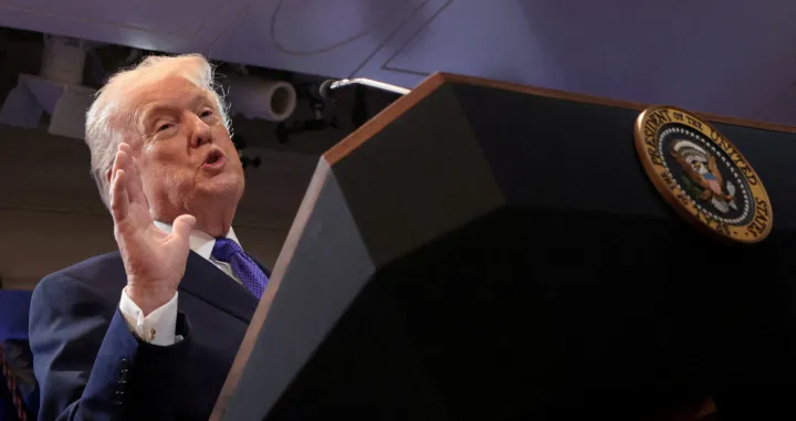 FILE PHOTO: U.S. President Donald Trump speaks at a press briefing at the White House, following the Supreme Court's ruling that he had exceeded his authority when he imposed tariffs, in Washington, D.C., U.S., February 20, 2026. REUTERS/Jonathan Ernst REFILE - CORRECTING MONTH/File Photo/Jonathan Ernst