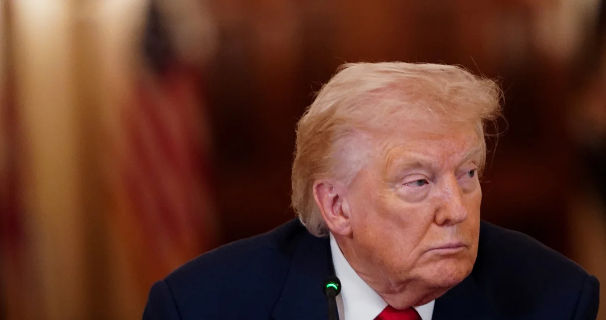 U.S. President Donald Trump looks on during a round table on collegiate sports in thWhite House in Washington, D.C., March 6, 2026. REUTERS/Nathan Howard/Nathan Howard