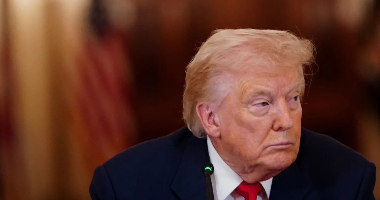 U.S. President Donald Trump looks on during a round table on collegiate sports in the White House in Washington, D.C., March 6, 2026. REUTERS/Nathan Howard/Nathan Howard