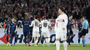 Soccer Football - UEFA Europa League - Round of 16 - First Leg - Vfb Stuttgart v FC Porto - MHPArena, Stuttgart, Germany - March 12, 2026 FC Porto's Terem Moffi reacts with VfB Stuttgart's Bilal El Khannouss after scoring their first goal REUTERS/Heiko Becker/Foto: Heiko Becker