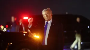 U.S. President Donald Trump gestures after disembarking Air Force One at Palm Beach International Airport in West Palm Beach, Florida, U.S., March 13, 2026. REUTERS/Kevin Lamarque/Kevin Lamarque