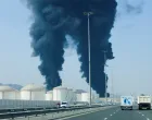 Smoke rises in the Fujairah oil industry zone, caused by debris after interception of a drone by air defenses, according to the Fujairah media office, amid the U.S.-Israel conflict with Iran, in Fujairah, United Arab Emirates, March 14, 2026. REUTERS/Staff/Staff