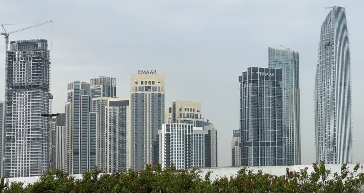 A damaged building in the vicinity of Dubai Creek Harbour after a drone fell on it, amid the U.S.-Israeli conflict with Iran, in Dubai, United Arab Emirates, March 12, 2026. Picture taken with a mobile phone. REUTERS/StringerвЂЁ/Stringer