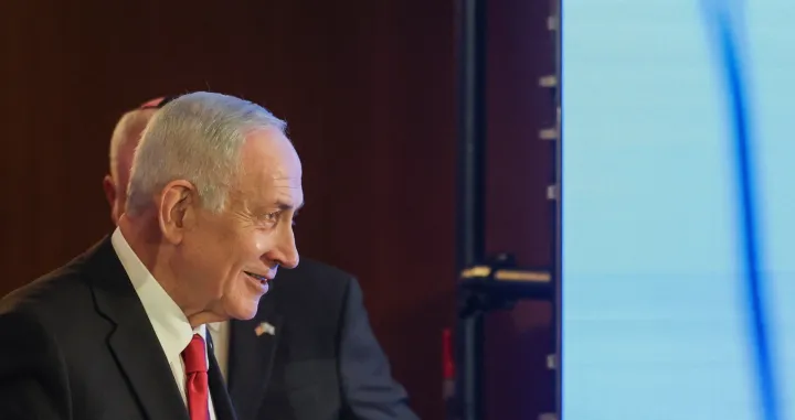 Israeli Prime Minister Benjamin Netanyahu gestures goes onstage to speak during the Conference of Presidents of Major American Jewish Organisations, in Jerusalem, February 15, 2026. REUTERS/Ronen Zvulun/Ronen Zvulun