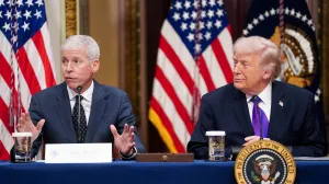 FILE PHOTO: U.S. President Donald Trump and Secretary of Energy Chris Wright attend a roundtable on the Ratepayer Protection Pledge in the Indian Treaty Room in the Eisenhower Executive Office Building on the White House campus in Washington, D.C., U.S., March 4, 2026. REUTERS/Nathan Howard/File Photo/Nathan Howard