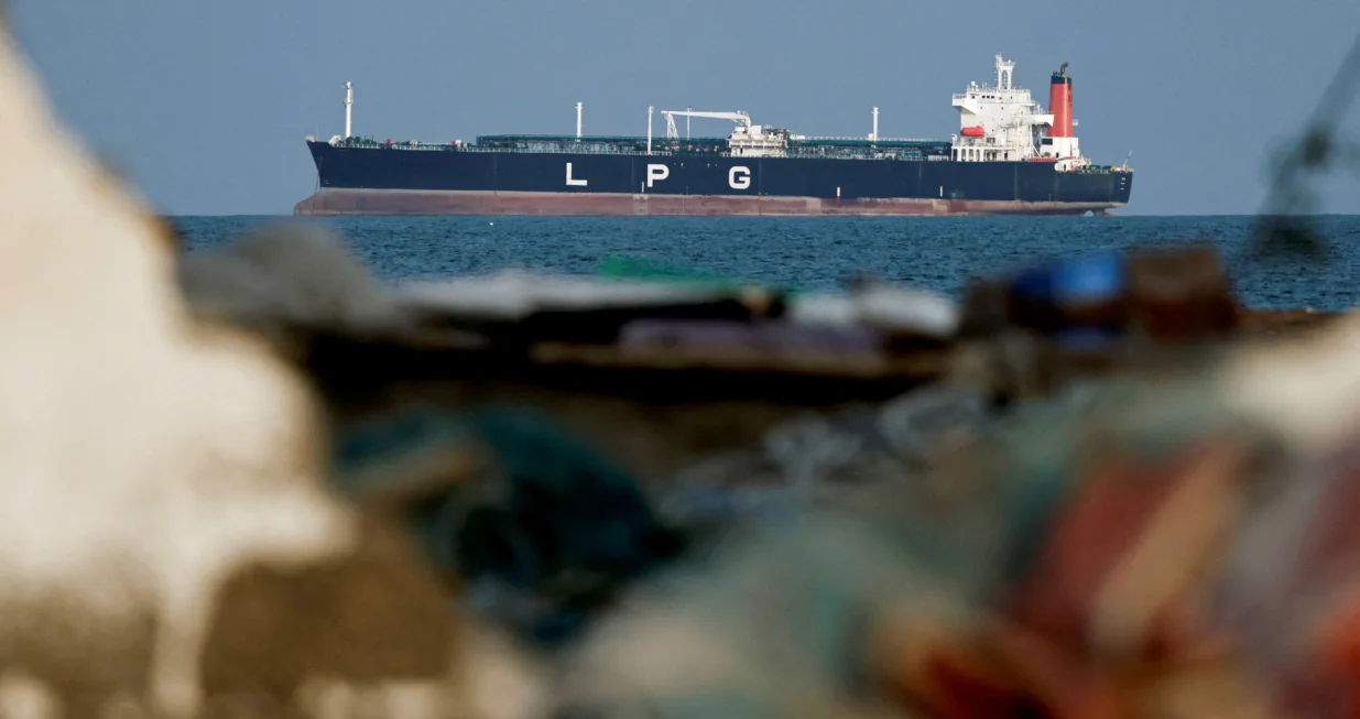 FILE PHOTO: An LPG gas tanker at anchor as traffic is down in the Strait of Hormuz, amid the U.S.-Israeli conflict with Iran, in Shinas, Oman, March 11, 2026. REUTERS/Benoit Tessier/File Photo/Benoit Tessier