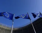 European Union flags flutter outside the European Commission headquarters in Brussels, Belgium Februrary 26, 2026. REUTERS/Yves Herman/Yves Herman