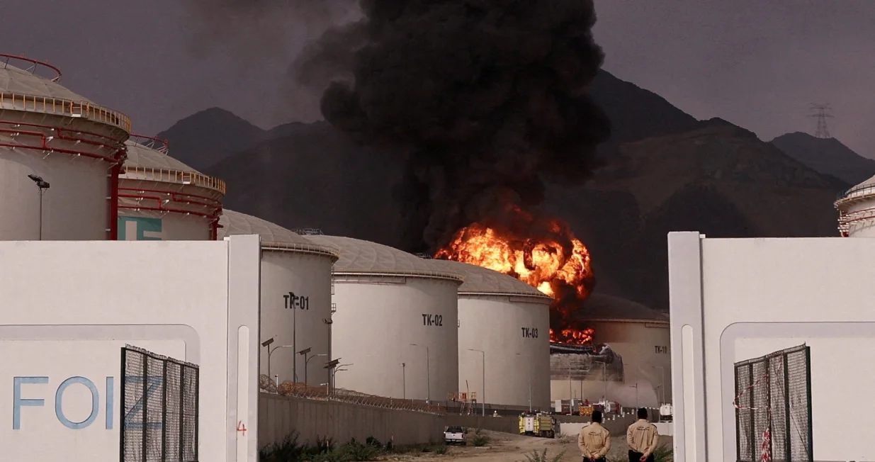FILE PHOTO: Fire and smoke rise in the Fujairah oil industry zone, caused by debris after interception of a drone by air defenses, according to the Fujairah media office, amid the U.S.-Israel conflict with Iran, in Fujairah, United Arab Emirates, March 4, 2026. REUTERS/Amr Alfiky/File Photo/Amr Alfiky