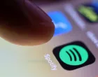 epa09044616 (FILE) - The logo of music streaming company Spotify is pictured on a smartphone in Taipei, Taiwan, 30 July 2020 (reissued 01 March 2021). Spotify confirmed on 01 March 2021 it had removed hundreds of K-Pop releases from its worldwide streaming services over licensing disputes with South Korean distributor Kakao M. EPA/RITCHIE B. TONGO *** Local Caption *** 56665503/Ritchie B. Tongo
