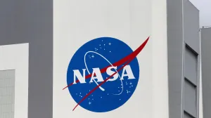 FILE PHOTO: The NASA logo is seen at Kennedy Space Center ahead of the NASA/SpaceX launch of a commercial crew mission to the International Space Station in Cape Canaveral, Florida, U.S., April 16, 2021. REUTERS/Joe Skipper/File Photo/Joe Skipper