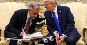 FILE PHOTO: U.S. President Donald Trump meets with Canada's Prime Minister Mark Carney in the Oval Office at the White House in Washington, D.C., U.S., October 7, 2025. REUTERS/Evelyn Hockstein/File Photo/Evelyn Hockstein